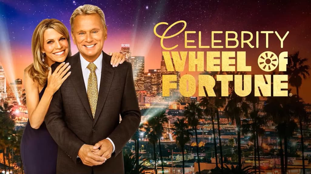 Pat Sajak and Vanna White stand together promoting "Celebrity Wheel of Fortune"