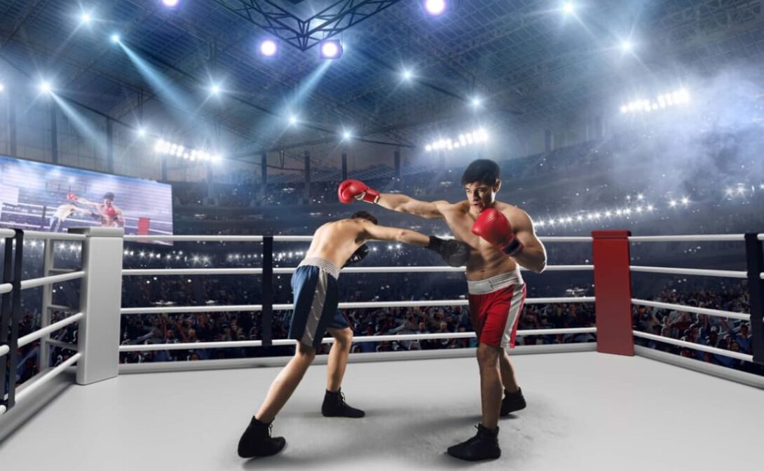 Two virtual boxers fighting in an animated boxing ring